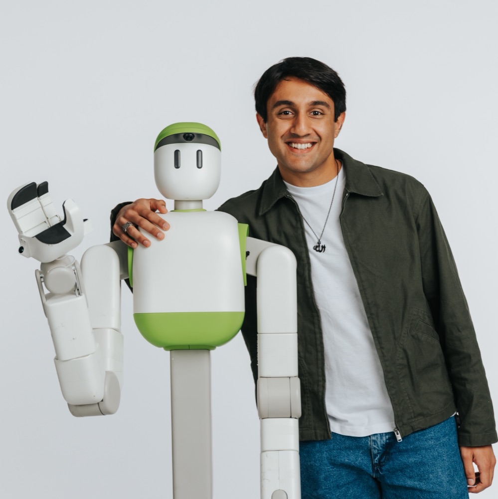 Sharil Maredia with a Sunday humanoid robot